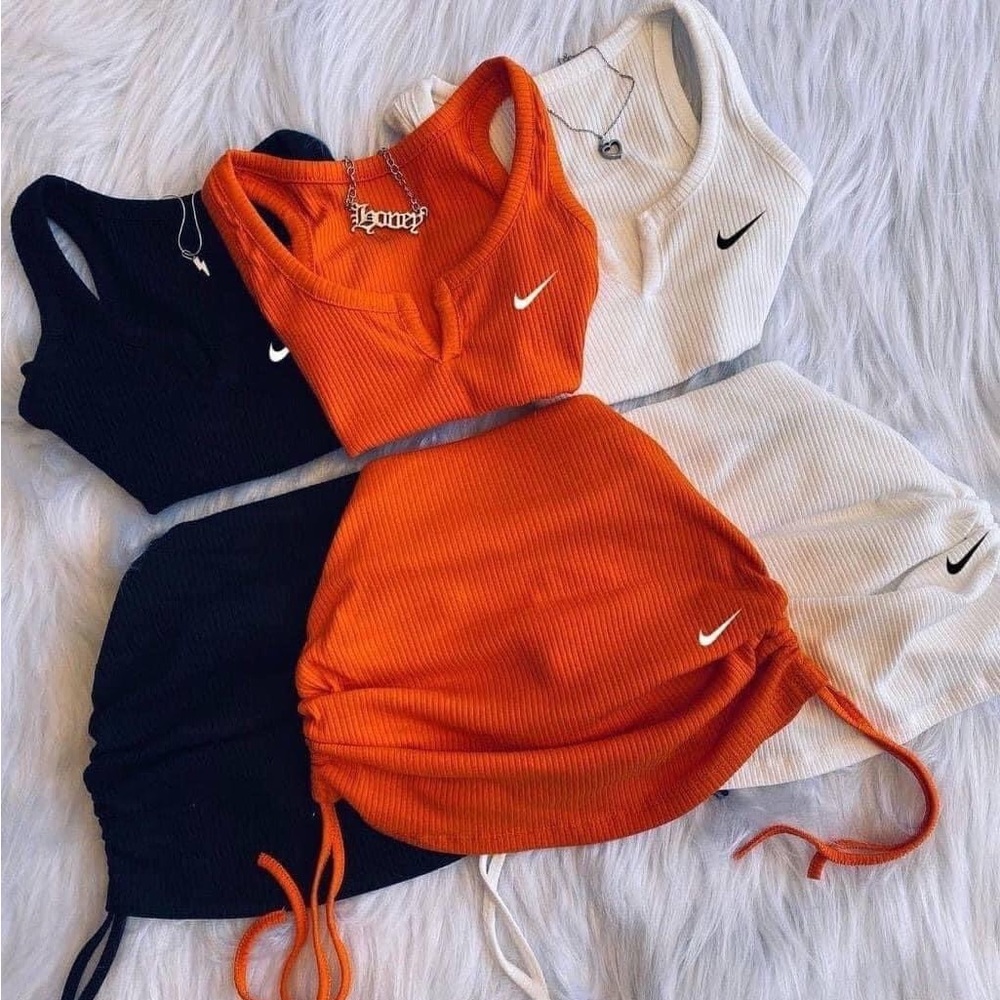 Swoosh check mark
Two-piece summer skirt set